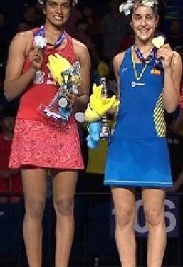 PV Sindhu (L) and Carolina Marin pose with their World Championships medals at Nanjing, Sunday