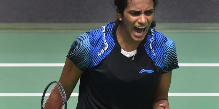 Indian shuttler PV Sindhu exults after winning the women's singles 2nd semifinal match against Japan's Akane Yamaguchi