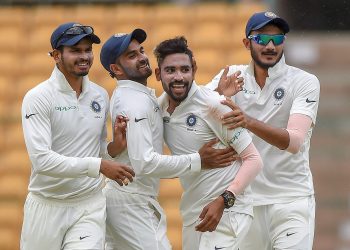 Mohammed Siraj (2nd from right) celebrates after dismissing a South Africa A wicket, Monday