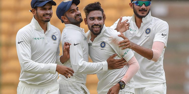 Mohammed Siraj (2nd from right) celebrates after dismissing a South Africa A wicket, Monday