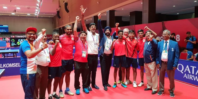 Table tennis Players and officials celebrate after India’s historic bronze, Tuesday