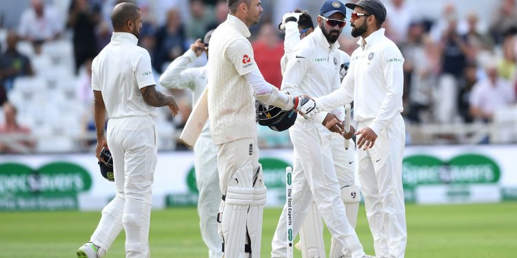India captain Virat Kohli (R) shakes hand with England’s James Anderson after completing the victory in the third Test at Trent Bridge, Wednesday 