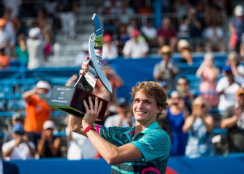 Alexander Zverev poses with the trophy after winning the singles crown at the Washington Open