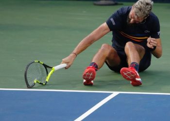 Benot Paire hurls his racqet on the court after losing to Marcos Baghdatis at the Washington Open