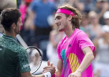 Novak Djokovic (L) congratulates Stefanos Tsitsipas after the latter’s stunning win, Thursday at Toronto 