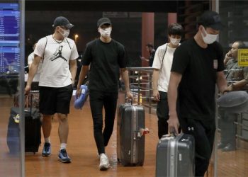 The four Japanese players at the Jakarta airport before their departure, Monday