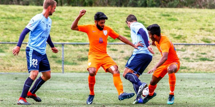 India U-23 (orange) and Sydney FC players in action during their match in Sydney, Tuesday