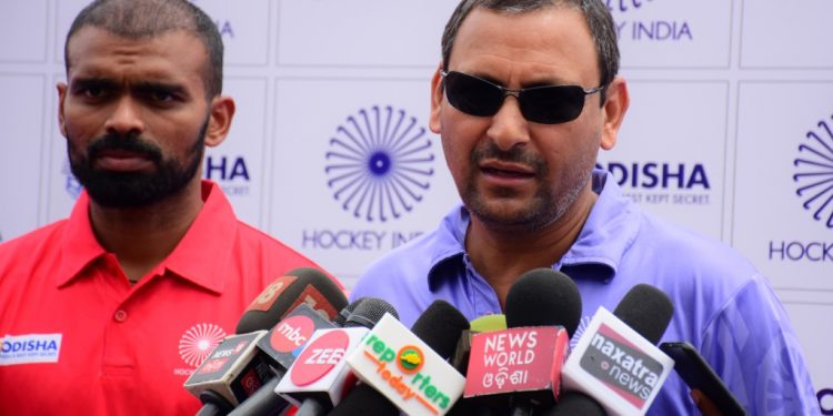 Captain of the Indian hockey team PR Sreejesh (L) and coach Harendra Singh talk with the media at Kalinga Stadium in Bhubaneswar, Wednesday 