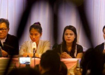 Pan Ei Mon, second left, wife of journalist Wa Lone, Chit Su Win, second right, wife of journalist Kyaw Soe Oo speaking to media Tuesday in Yangon.     PTI photo