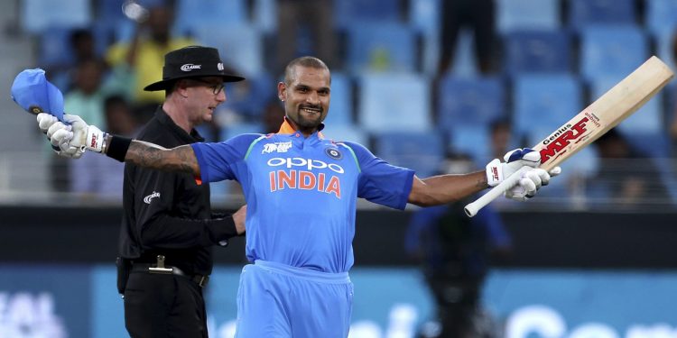 Shikhar Dhawan celebrates after scoring his 14th ODI century against Hong Kong in Dubai