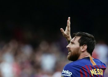 Barcelona's Lionel Messi celebrates scoring the opening goal against Huesca at the Camp Nou stadium