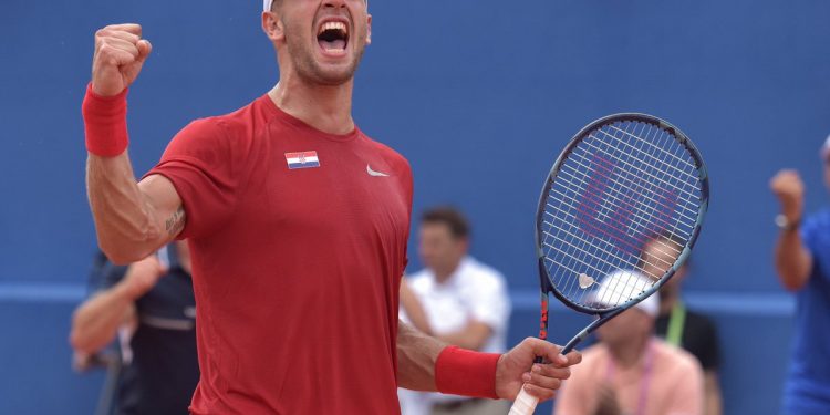Crotia’s Borna Coric is all pumped up after winning his match against Frances Tiafoe of the US