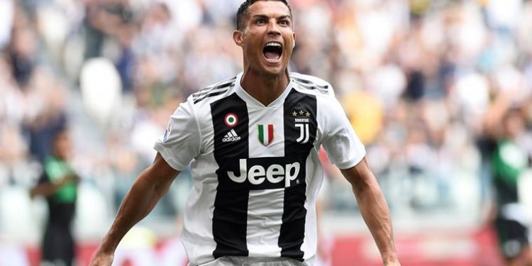 Cristiano Ronaldo celebrates after scoring his first goal in Juventus colours against Sassuolo in Turin, Sunday