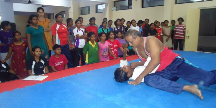 Hari Patnaik demonstrates some self defence skills at Utkal Karate School