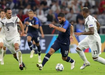 Germany (in white) and France players battle it out during their Nations League encounter