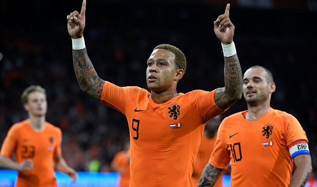 Memphis Depay celebrates one of his goals against Peru