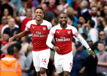 Arsenal’s Pierre-Emerick Aubameyang (L) and Alexandre Lacazette celebrate after the latter’s winning goal against Cardiff City, Sunday