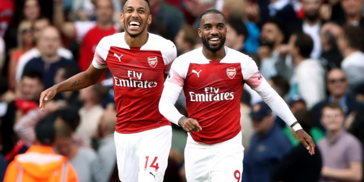 Arsenal’s Pierre-Emerick Aubameyang (L) and Alexandre Lacazette celebrate after the latter’s winning goal against Cardiff City, Sunday