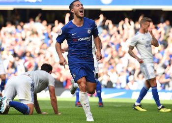 Eden Hazard celebrates after completing his hat-trick against Cardiff City, Saturday