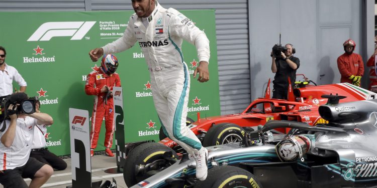 Mercedes driver Lewis Hamilton of Britain celebrates after winning the Formula One Italy Grand Prix at the Monza racetrack