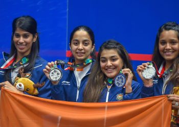 India's women squash team (L-R) Joshana Chinappa, Tanvi Khanna, Sunayna Kuruvilla and Dipika Pallikal Karthik pose with their silver medal after the presentation ceremony
