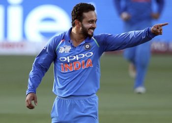 Kedar Jadhav celebrates the dismissal of Bangladesh's Mushfiqur Rahim during the Asian Cup final in Dubai