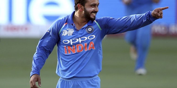 Kedar Jadhav celebrates the dismissal of Bangladesh's Mushfiqur Rahim during the Asian Cup final in Dubai