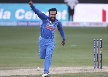 Kedar Jadhav celebrates after dismissing a Pakistani batsman, Wednesday