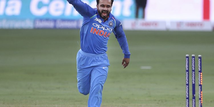 Kedar Jadhav celebrates after dismissing a Pakistani batsman, Wednesday