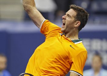 Juan Martin del Potro celebrates after defeating Borna Coric at the US Open tennis tournament Sunday