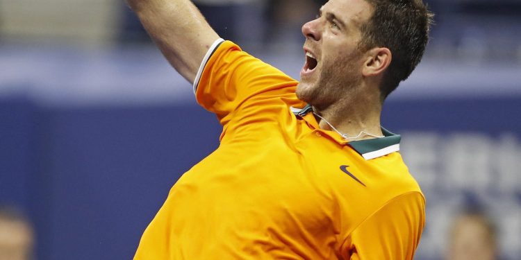 Juan Martin del Potro celebrates after defeating Borna Coric at the US Open tennis tournament Sunday