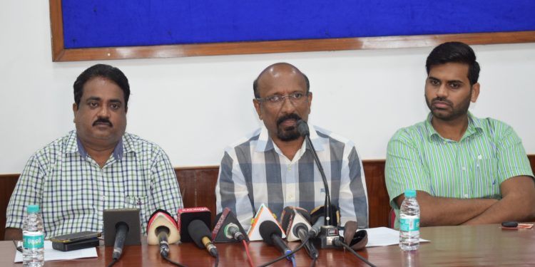 AFI general secretary CK Valson (C) along with state sports department officials Manoj Padhi (L) and Sumit Pandey address the media at the Kalinga Stadium conference hall, Tuesday           