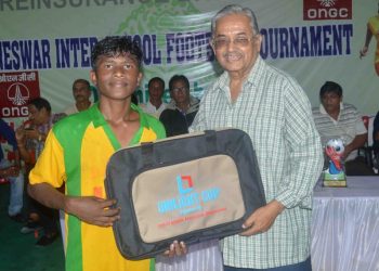 Sundar Mohan Kisko of Unit-I High School receives the man of the match award in Bhubaneswar, Thursday
