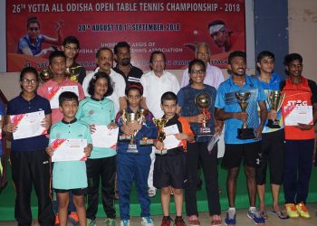 Winners in different categories of the YGTTA All Odisha Open Table Tennis Championships pose with their trophies and certificates along with guests at Cuttack, Saturday   