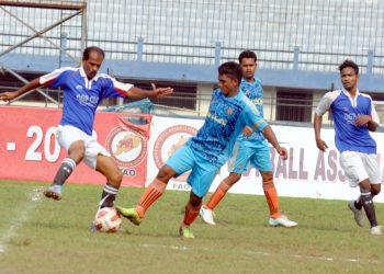 OGP and Town Club players in action during their match at Barabati Stadium in Cuttack, Tuesday