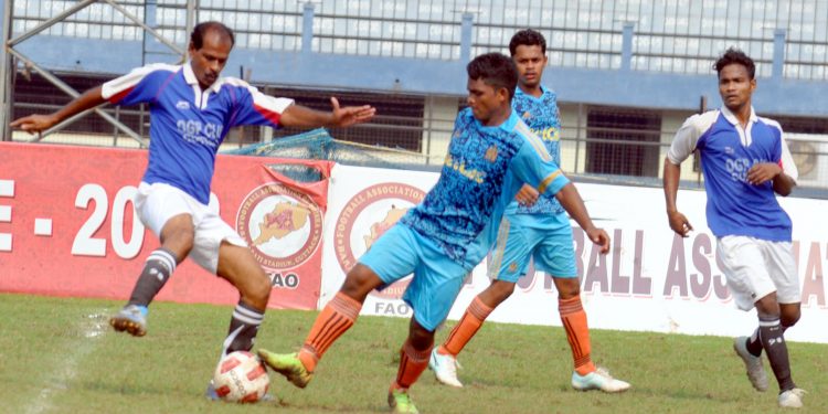 OGP and Town Club players in action during their match at Barabati Stadium in Cuttack, Tuesday