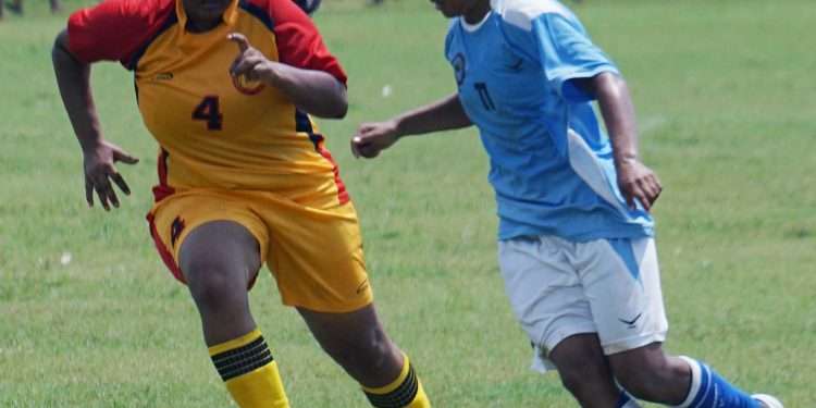 Odisha and Telangana players in action during their match at Cuttack, Saturday    