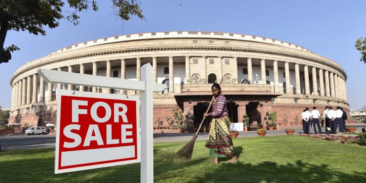 NEW DELHI, INDIA - FEBRUARY 23: A Lady cleans compound of Parliament House on the first day of the Budget Session on February 23, 2016 in New Delhi, India. (Photo by Arvind Yadav/Hindustan Times via Getty Images)