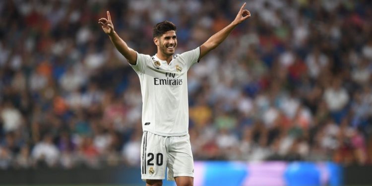 Marco Asensio celebrates after scoring for Real Madrid against Espanyol