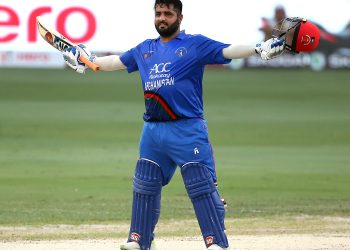 Afghanistan’s Mohammad Shahzad celebrates his century against India at Dubai, Tuesday