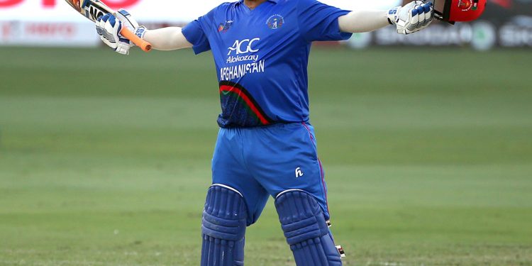 Afghanistan’s Mohammad Shahzad celebrates his century against India at Dubai, Tuesday