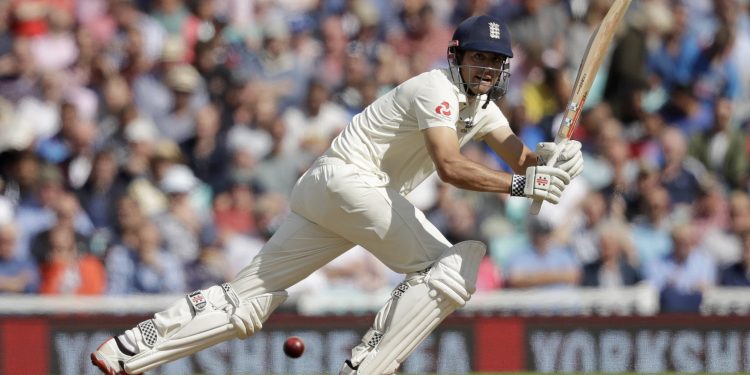 Alastair Cook hits a shot in his last ever test match against India at the Oval cricket ground in London, Friday