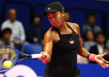 Naomi Osaka plays a forehand against Camila Giorgi in Tokyo, Saturday