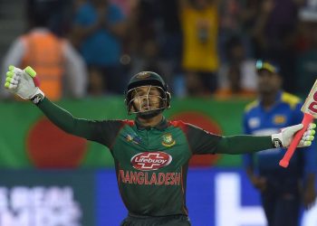 Mushfiqur Rahim celebrates his century against Sri Lanka  at the Dubai International Cricket Stadium, Saturday