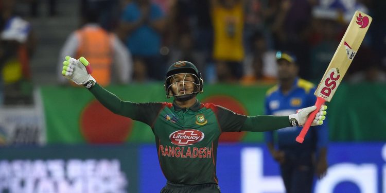 Mushfiqur Rahim celebrates his century against Sri Lanka  at the Dubai International Cricket Stadium, Saturday