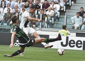 Cristiano Ronaldo of Juventus shoots to score his second goal in the Serie A game against Sassuolo, Sunday