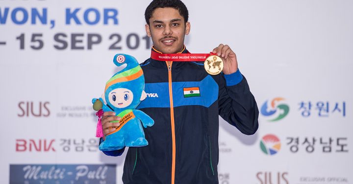 Vijayveer Sidhu poses with his 25m standard pistol junior gold at Changwon, Friday