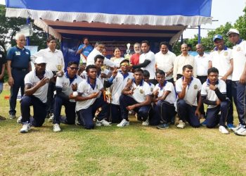 Jubilant Odisha team and officials with the winner’s trophy in Bhubaneswar, Sunday 