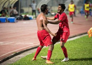 Ali Fasir (shirtless) of Maldives celebrates with a teammate after scoring the winner against India in the SAFF Cup final in Dhaka