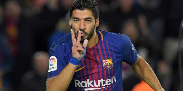 Luis Suarez celebrates after scoring Barcelona’s equaliser against Real Sociedad, Saturday